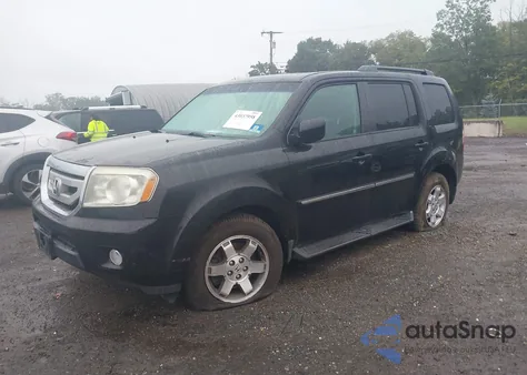 2010 Honda Pilot Touring z USA, uszkodzony, nr VIN 5FNYF4H84AB011640